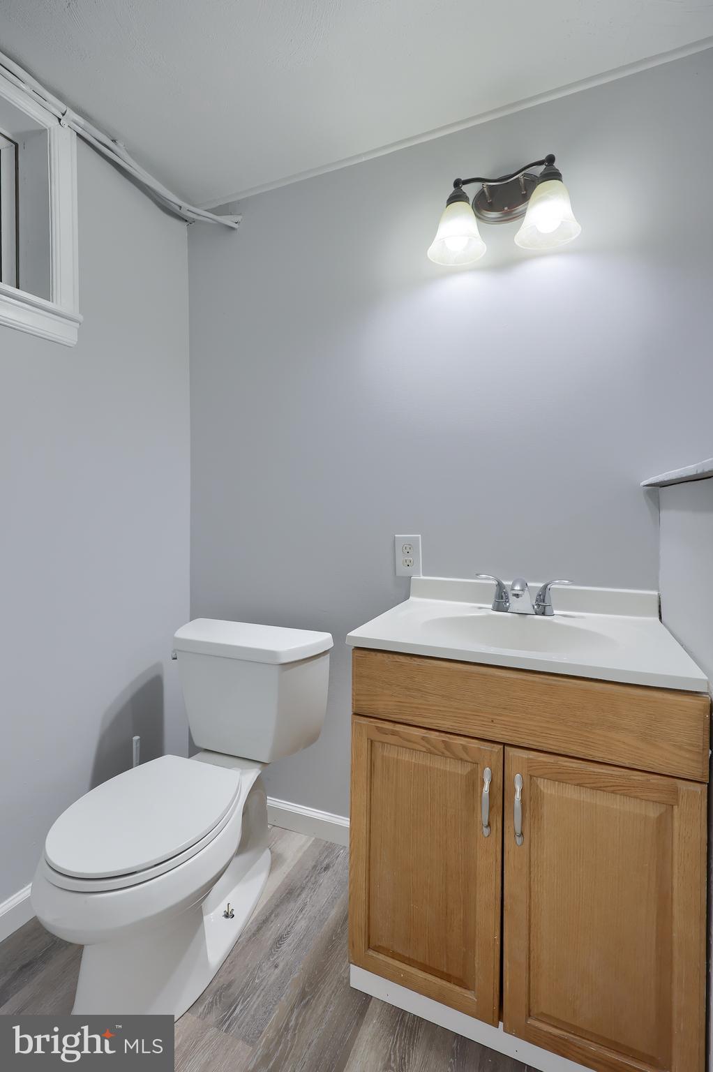 470 Oak Hollow Road Red Lion, PA 17356 - Photo 41 of 84 a bathroom with a sink a toilet and vanity