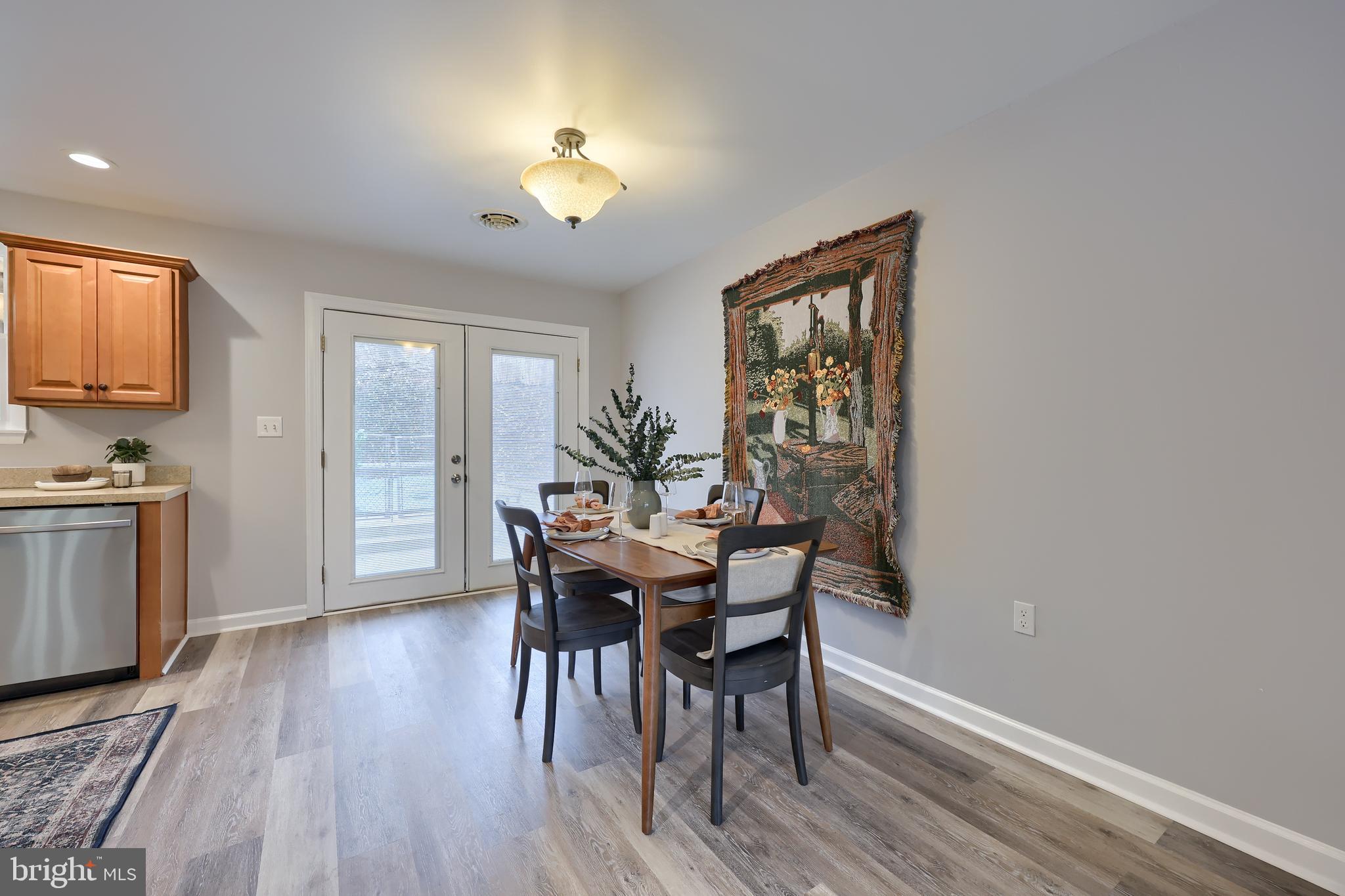 470 Oak Hollow Road Red Lion, PA 17356 - Photo 10 of 84 a view of a dining room with furniture window and wooden floor