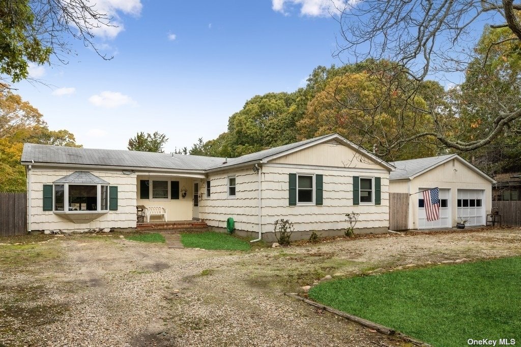 a front view of a house with yard