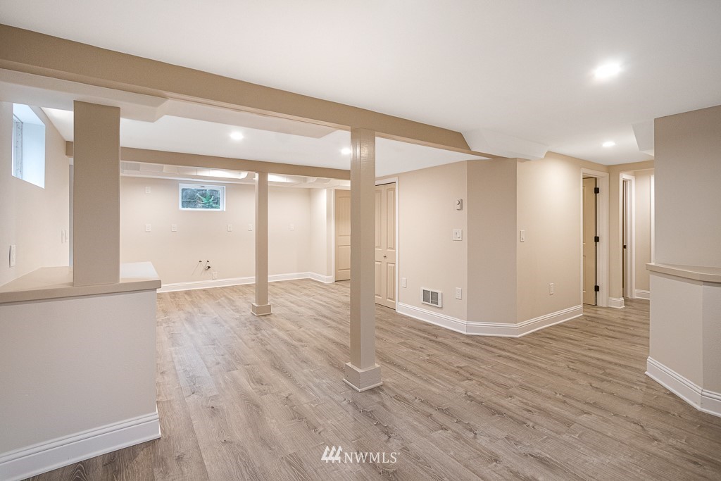 6715 35th Avenue Southwest Seattle, WA 98126 - Photo 20 of 31 a view of a livingroom with wooden floor