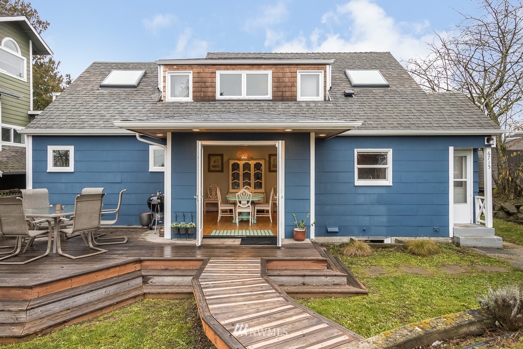6715 35th Avenue Southwest Seattle, WA 98126 - Photo 25 of 31 a front view of a house with swimming pool