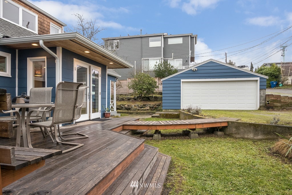 6715 35th Avenue Southwest Seattle, WA 98126 - Photo 26 of 31 a front view of a house with swimming pool