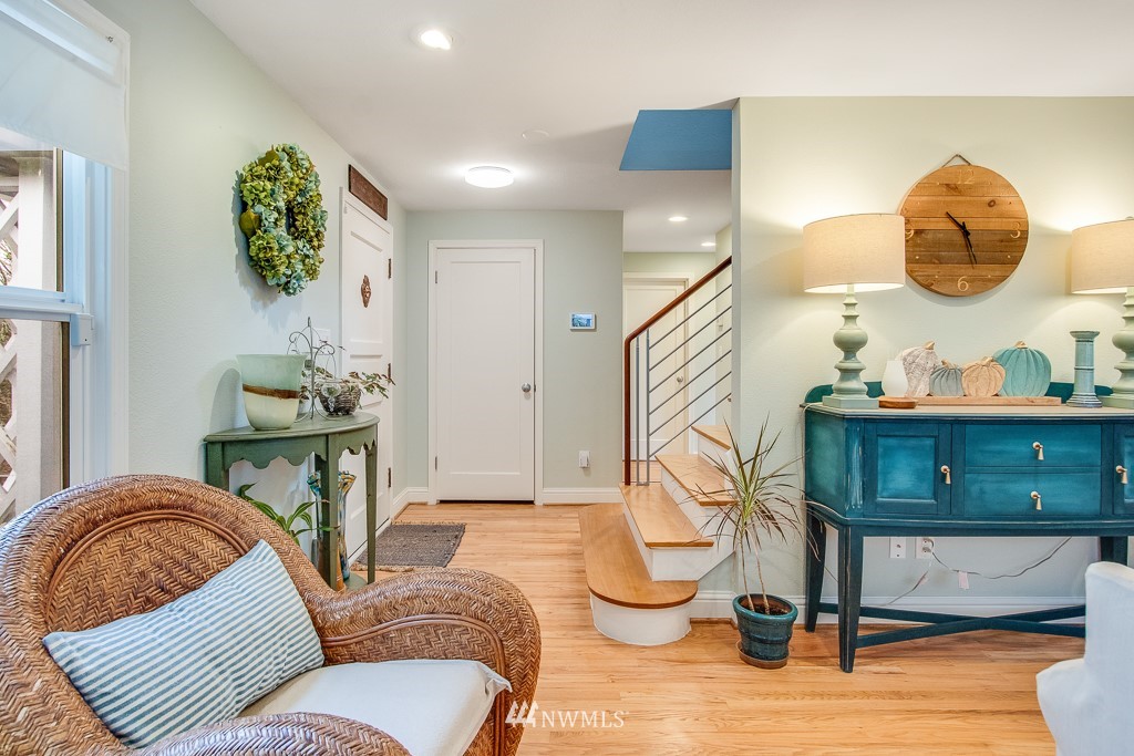 6715 35th Avenue Southwest Seattle, WA 98126 - Photo 5 of 31 a living room with furniture and a wooden floor