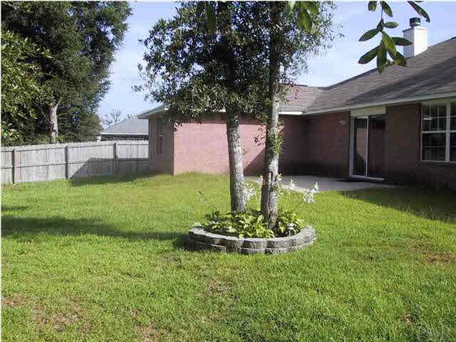 6973 Raburn Road Pensacola, FL 32526 - Photo 5 of 14 Perfect sized backyard