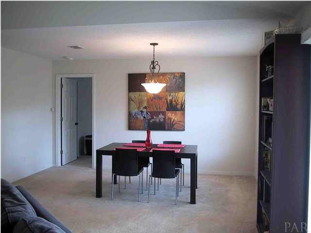 6973 Raburn Road Pensacola, FL 32526 - Photo 6 of 14 Dining area will easily sit 8 people
