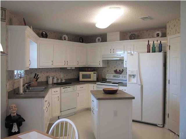 6973 Raburn Road Pensacola, FL 32526 - Photo 7 of 14 You will never run out of space in this kitchen