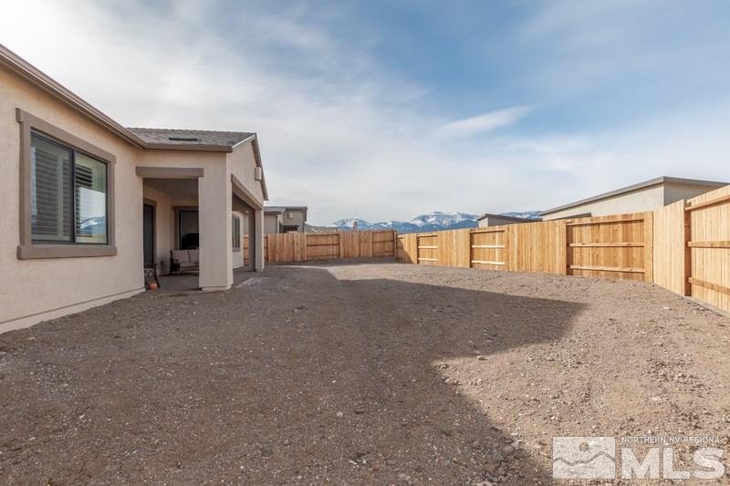 2537 Titanium Crest Drive Reno, NV 89521 - Photo 21 of 26 a view of a livingroom with a staircase