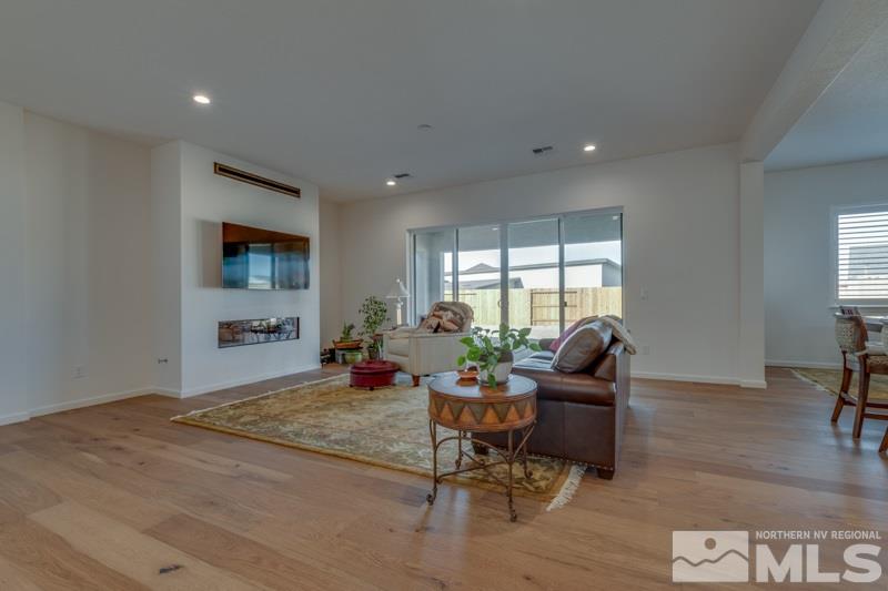 2537 Titanium Crest Drive Reno, NV 89521 - Photo 6 of 26 a living room with furniture and a window