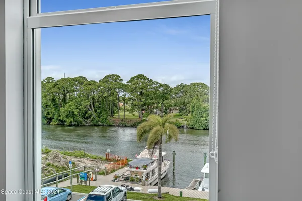 a bedroom with a bed furniture and a window