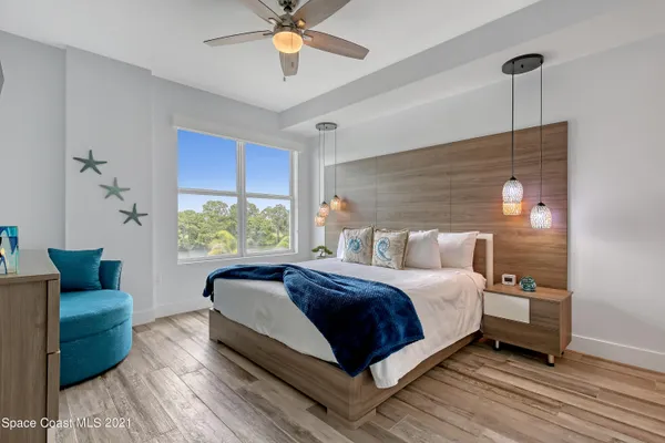 a bathroom with a toilet a sink and a mirror