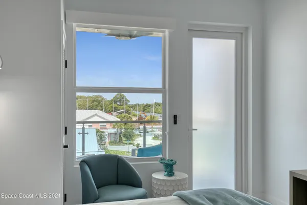 a view of a swimming pool with a lounge chairs