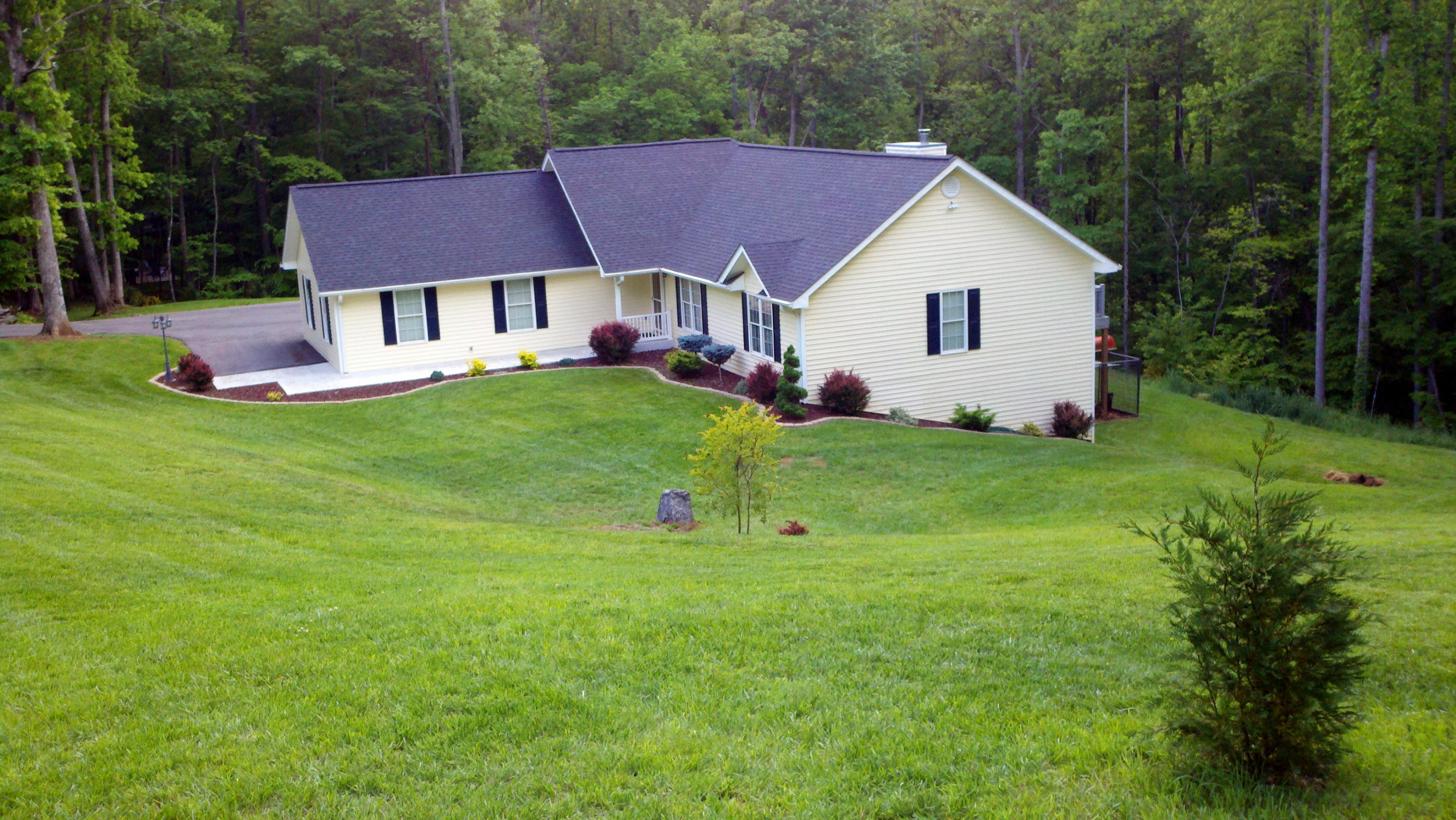 1207 Rabbit Run Road Goodview, VA 24095 - Photo 1 of 36 a view of a house with a yard and sitting area
