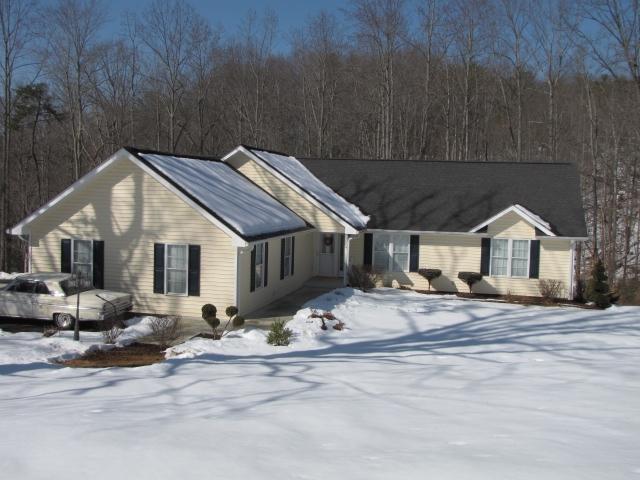1207 Rabbit Run Road Goodview, VA 24095 - Photo 4 of 36 a house with a outdoor space