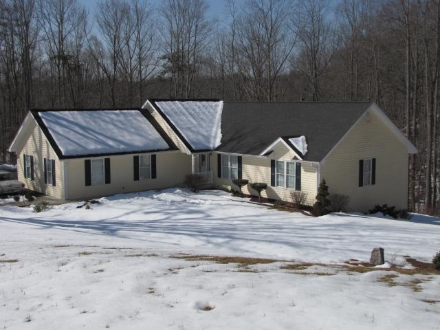 1207 Rabbit Run Road Goodview, VA 24095 - Photo 36 of 36 a view of a house with a yard