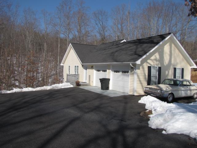 1207 Rabbit Run Road Goodview, VA 24095 - Photo 5 of 36 a view of a house with a patio