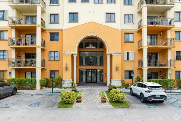 a view of a car park in front of a building
