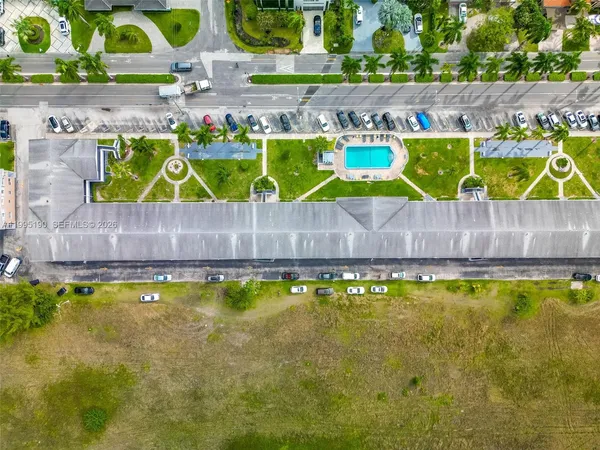 a view of swimming pool with outdoor space and seating area