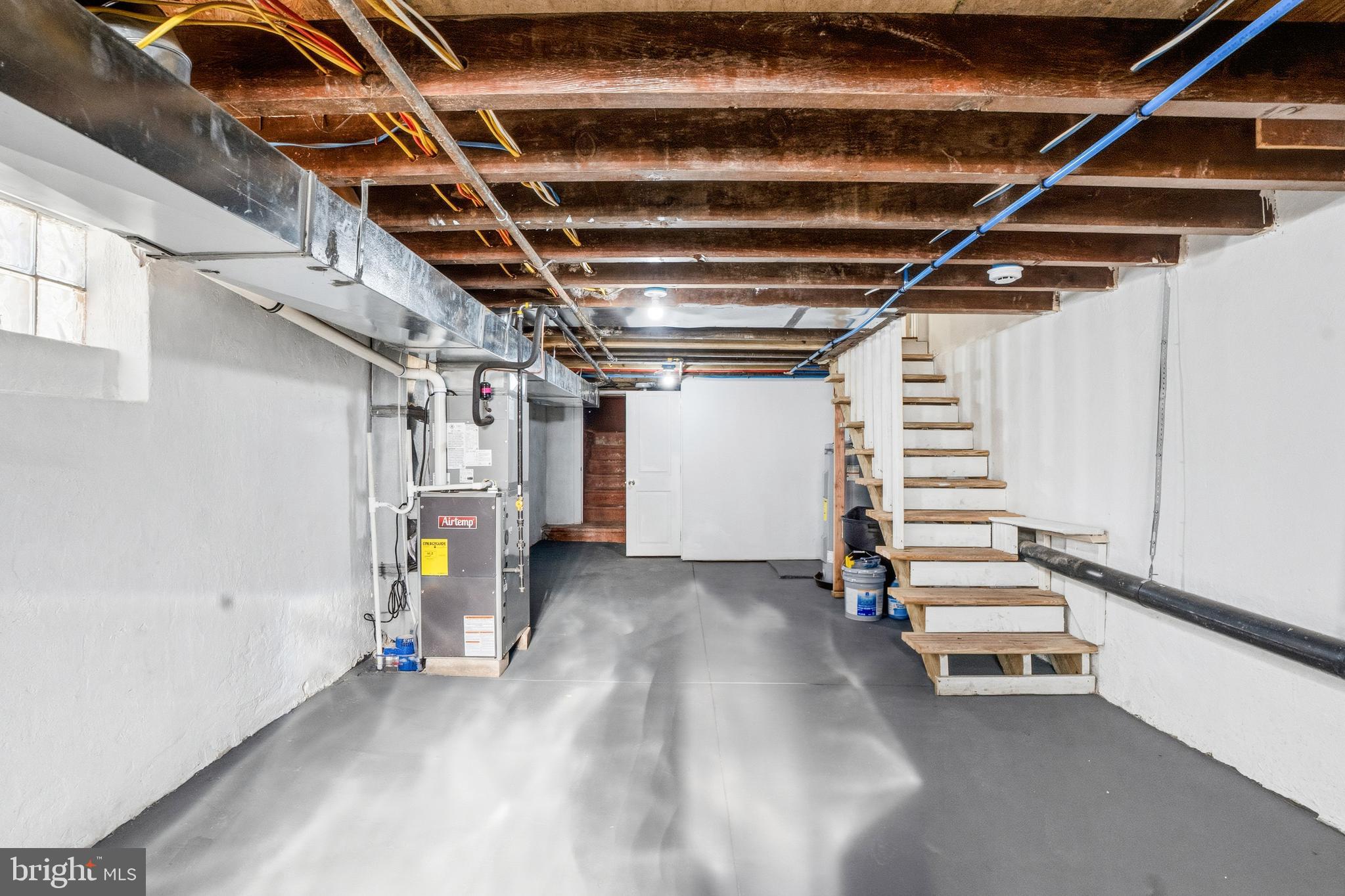1281 Jackson Street Camden, NJ 08104 - Photo 22 of 43 a view of storage and utility room with stairs