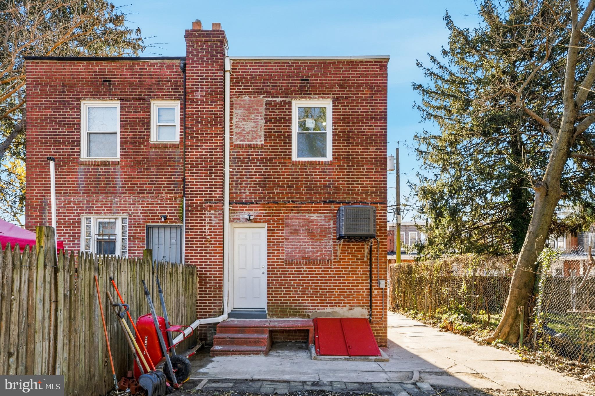 1281 Jackson Street Camden, NJ 08104 - Photo 30 of 43 a front view of a house with a yard
