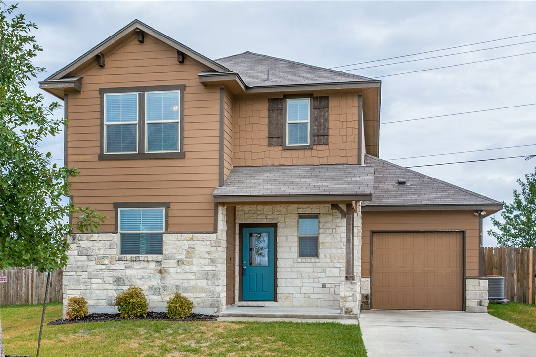 416 Amber Lane Jarrell, TX 76537 - Photo 1 of 1 a front view of a house with a yard