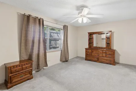 a room with furniture and a window