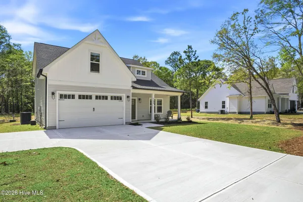 $430,000 | 2409 Sunset Harbor Road Southeast, Bolivia, NC 28422