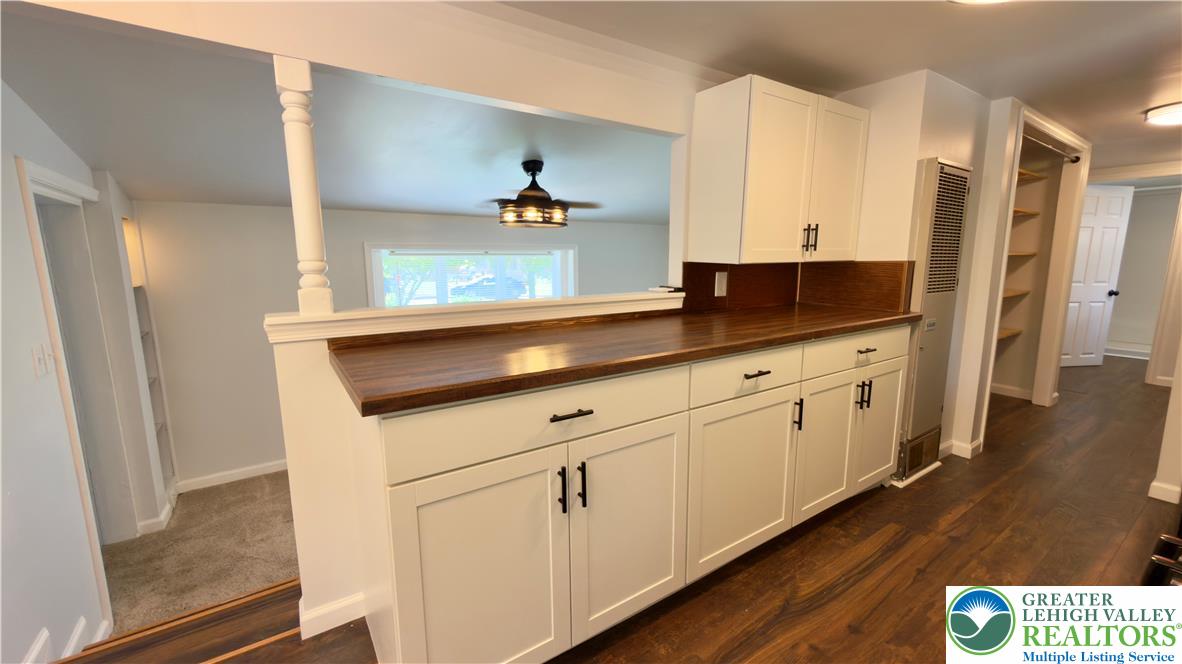 246 Poplar Street Bath, PA 18014 - Photo 18 of 34 A streamlined kitchen pass-through connects to the adjacent living area, promoting an open and airy feel.