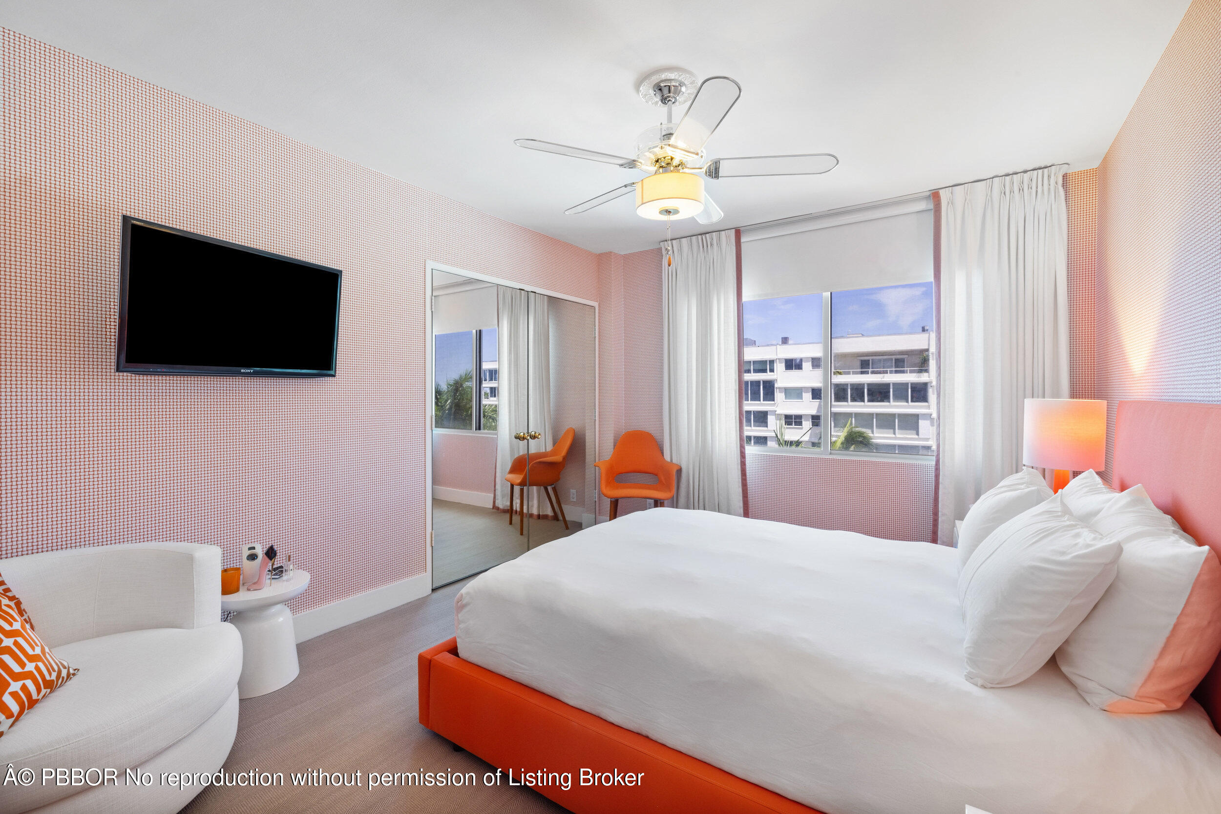 44 Cocoanut Row, Unit 510B & 511B Palm Beach, FL 33480 - Photo 11 of 24 a bedroom with a bed and a chandelier