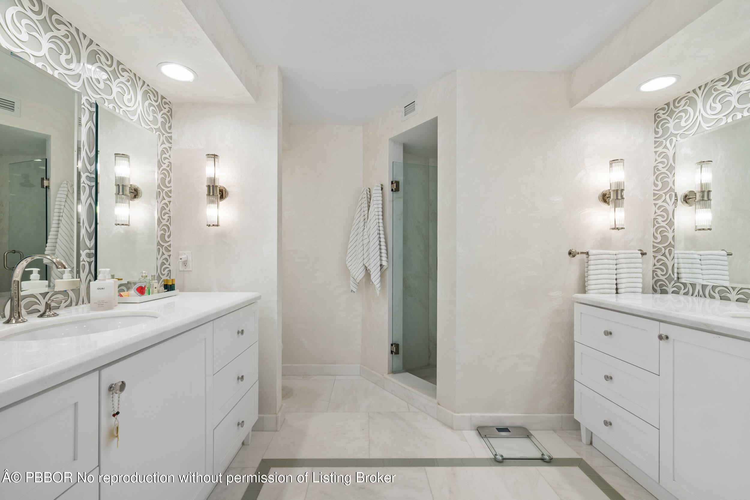 44 Cocoanut Row, Unit 510B & 511B Palm Beach, FL 33480 - Photo 22 of 24 a bathroom with a double vanity sink mirror and double