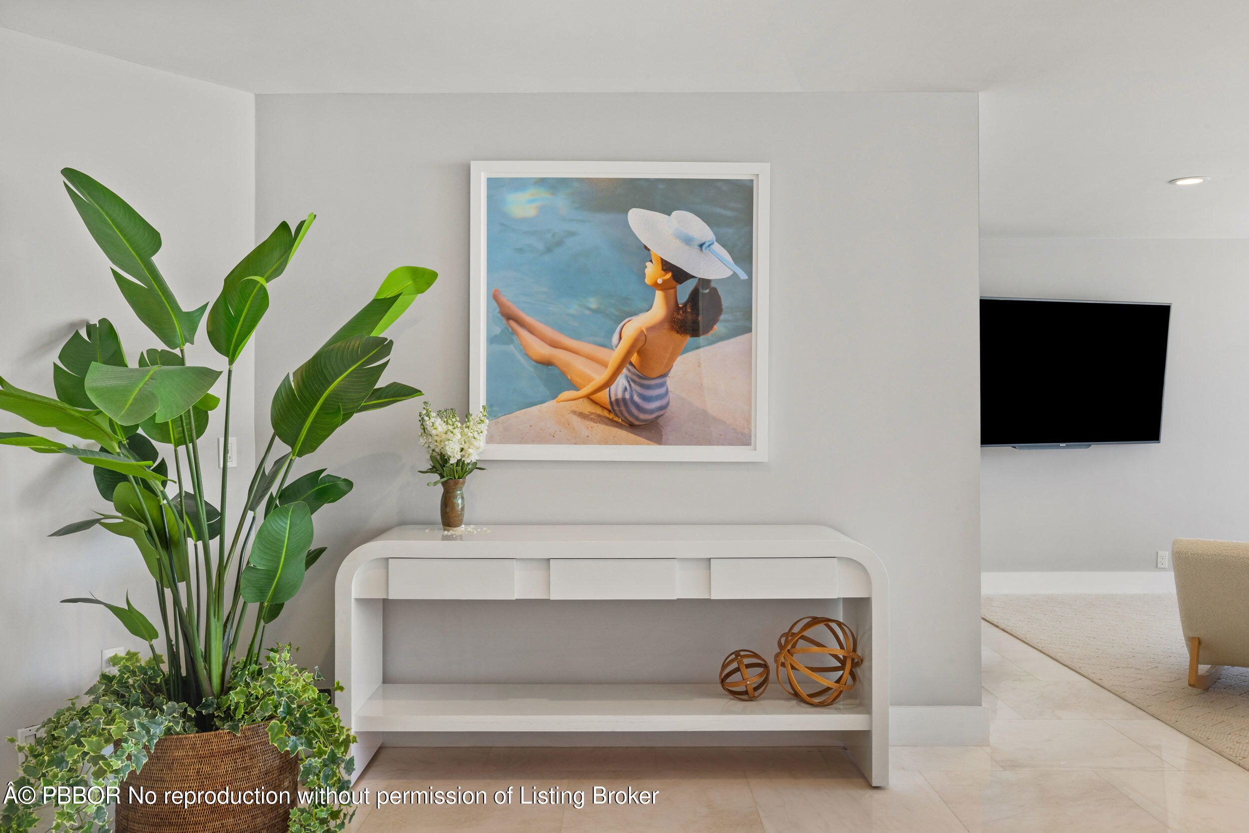 44 Cocoanut Row, Unit 510B & 511B Palm Beach, FL 33480 - Photo 3 of 24 a living room with furniture and a potted plant