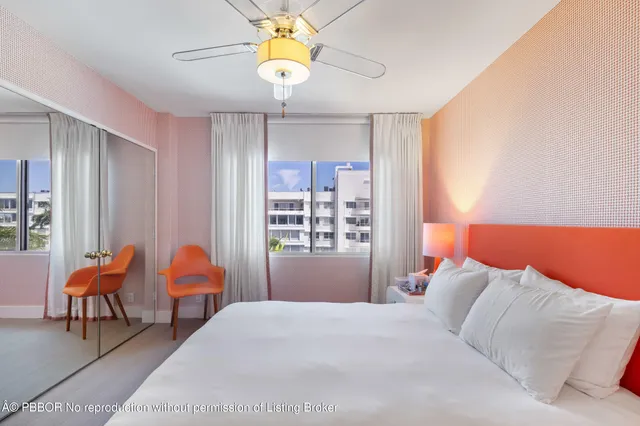 a bedroom with bed and window