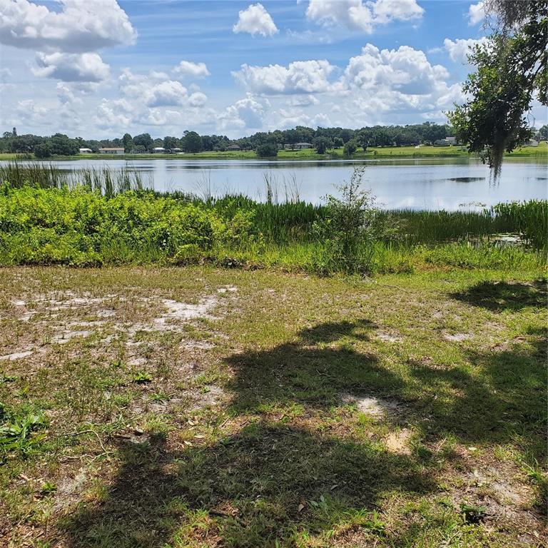 949 North Lake Street Lake Hamilton, FL 33844 - Photo 2 of 11 a view of a lake with a city