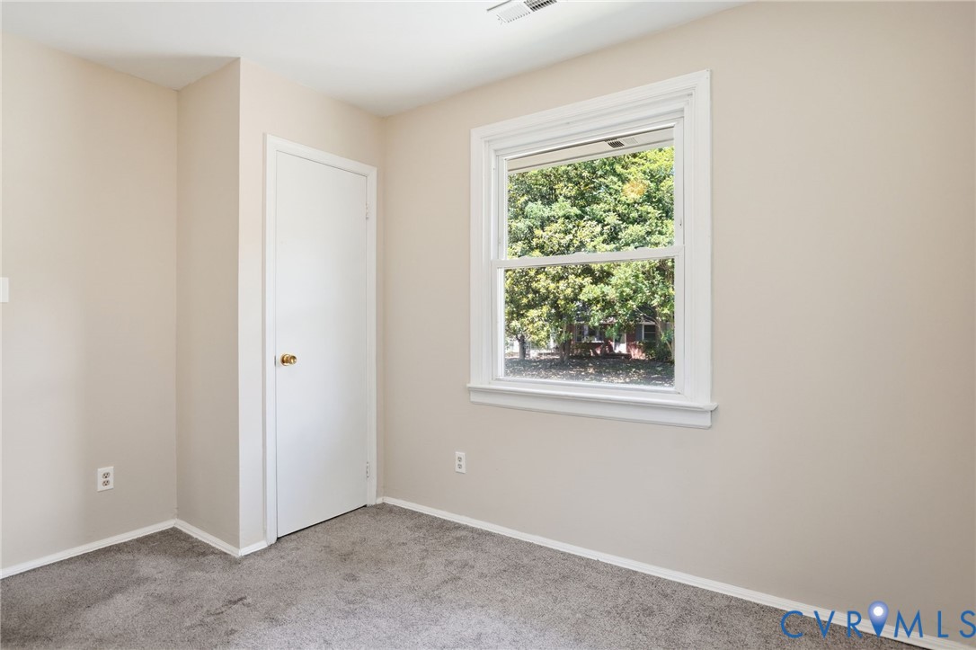 2403 Omega Road Henrico, VA 23228 - Photo 23 of 39 an empty room with a window