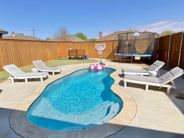 a vase of flowers sitting on a table