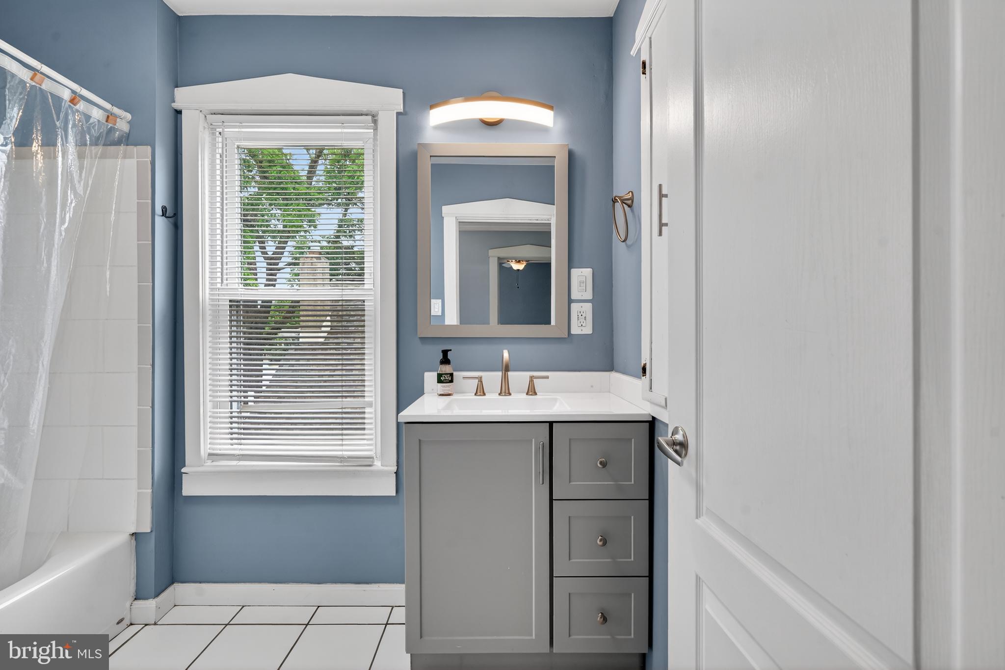 106 Ford Street Voorhees, NJ 08043 - Photo 23 of 36 a bathroom with a sink and a mirror