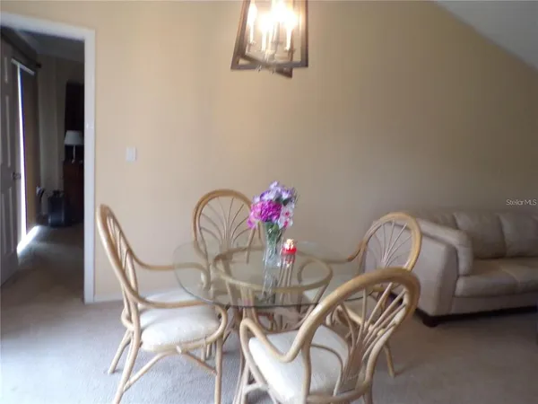 a view of a dining room with furniture