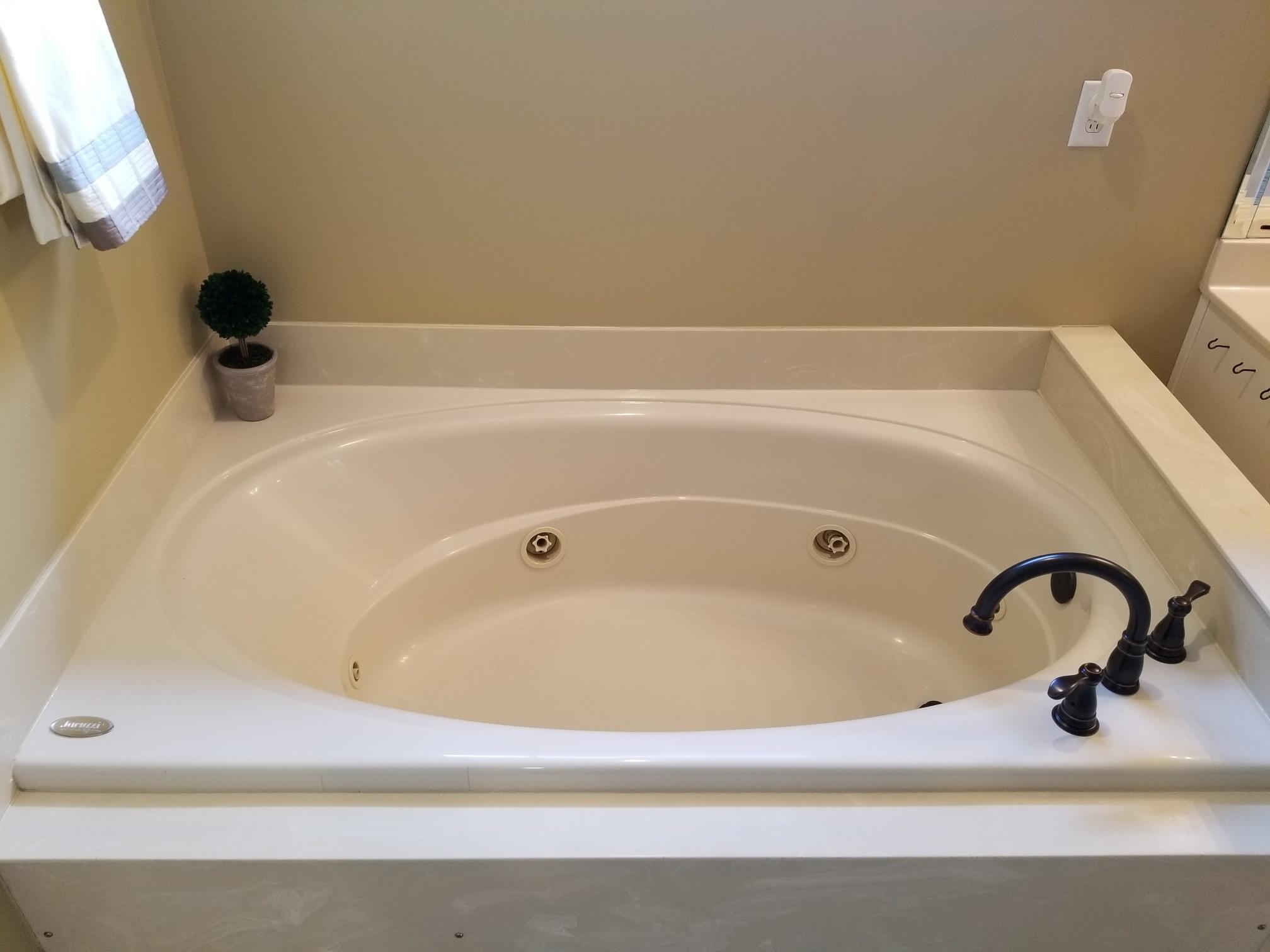 5249 Ridgefalls Way Antioch, TN 37013 - Photo 11 of 23 a bathroom with a bathtub