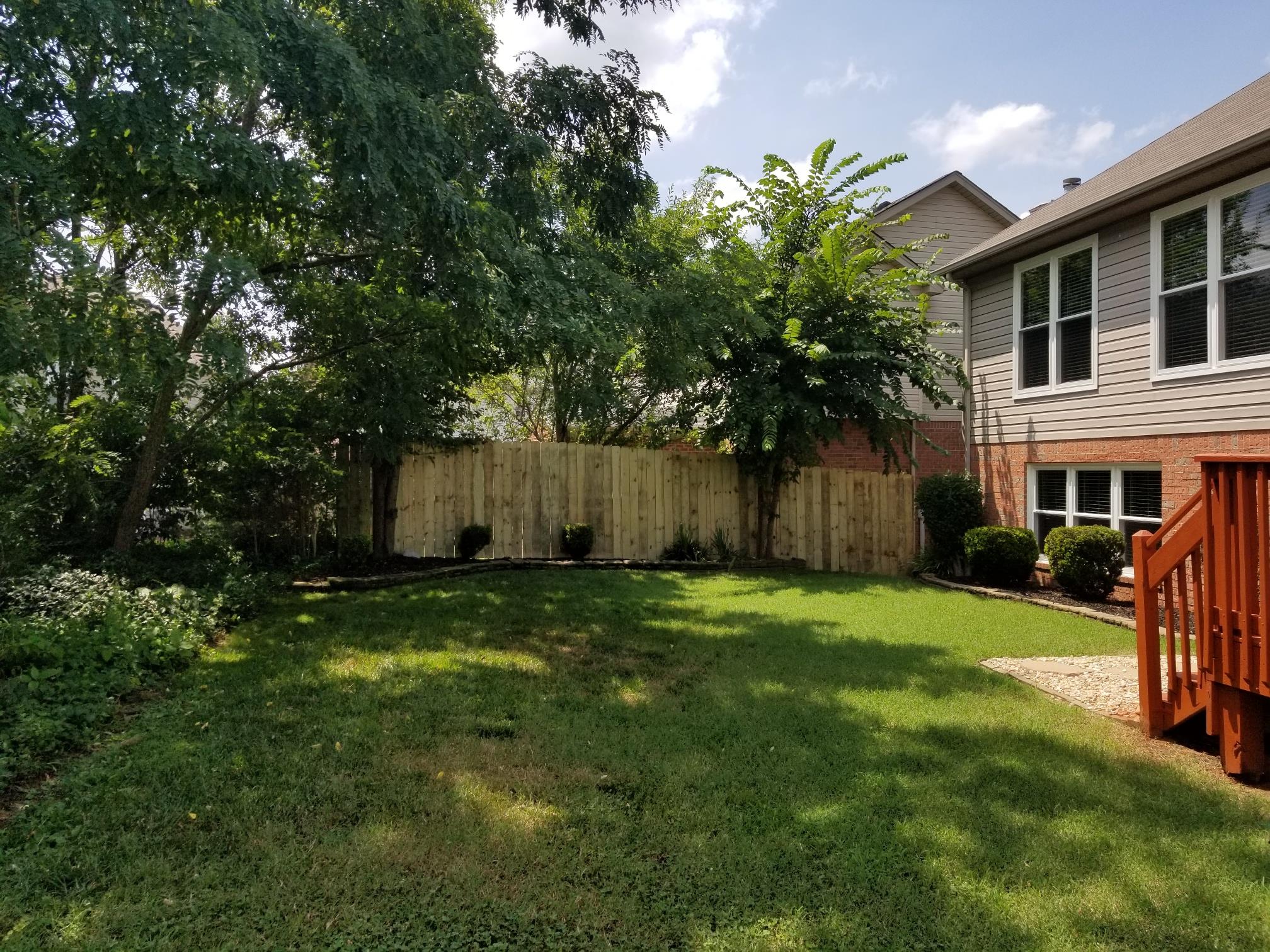 5249 Ridgefalls Way Antioch, TN 37013 - Photo 22 of 23 a view of a house with a yard