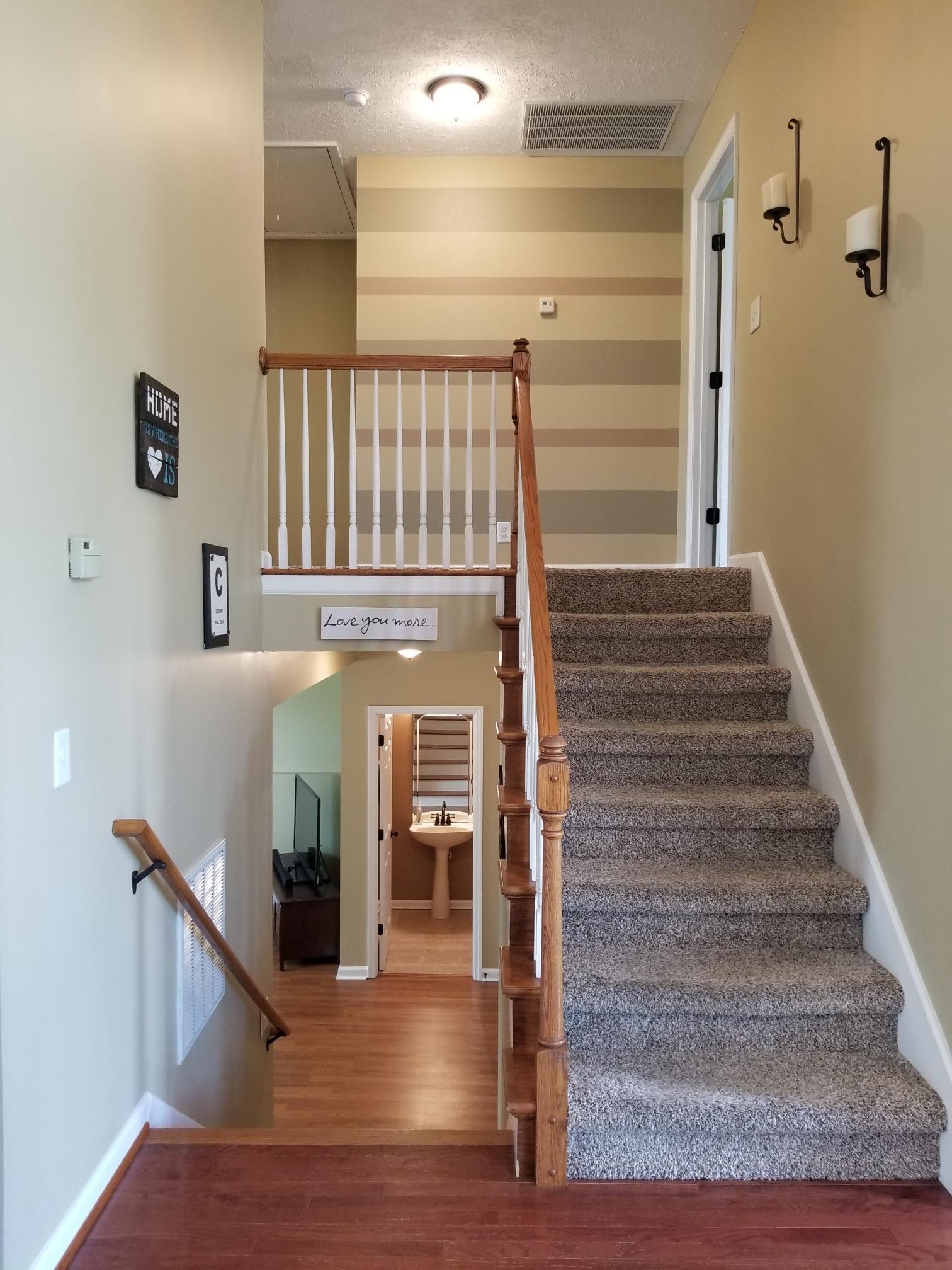 5249 Ridgefalls Way Antioch, TN 37013 - Photo 8 of 23 a view of entryway and hall with wooden floor