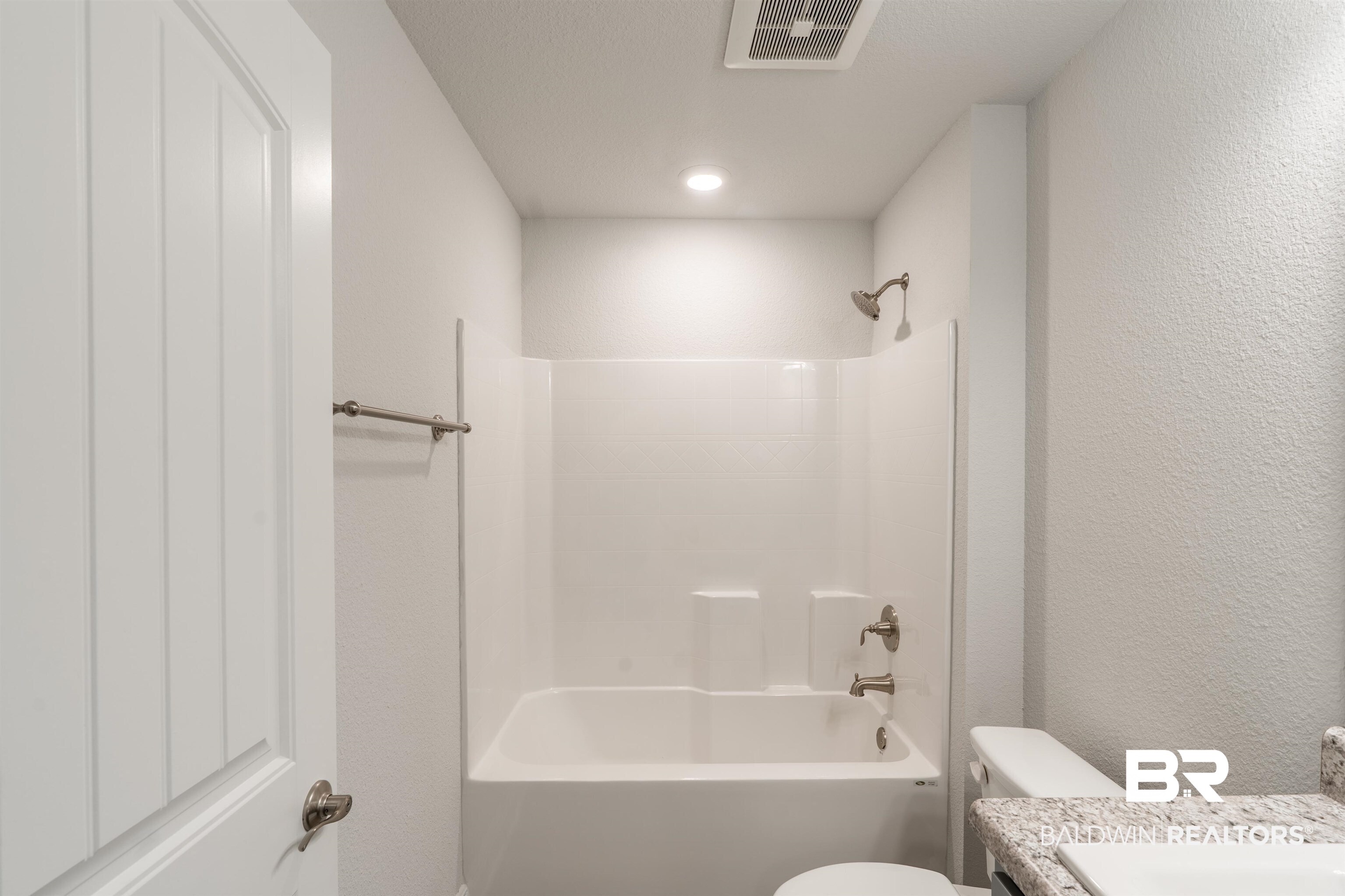 1906 Stonepine Drive South Semmes, AL 36575 - Photo 18 of 30 Full bath with tub / shower combination, vanity, and a textured wall