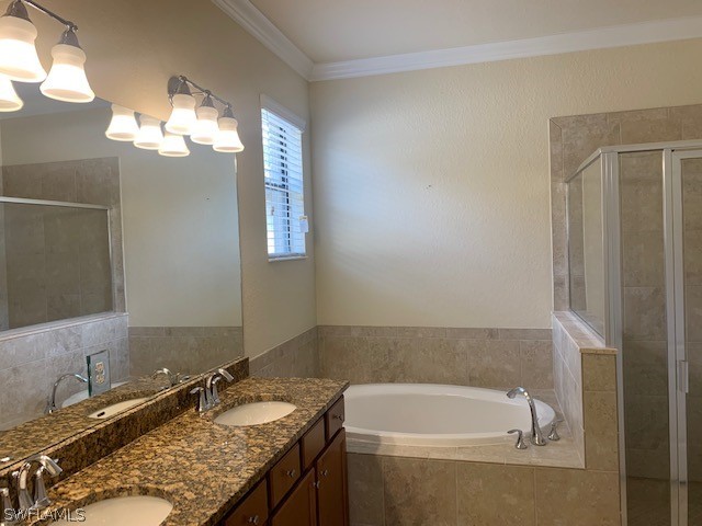 8976 Water Tupelo Road Fort Myers, FL 33912 - Photo 17 of 35 a bathroom with a granite countertop sink and a bathtub
