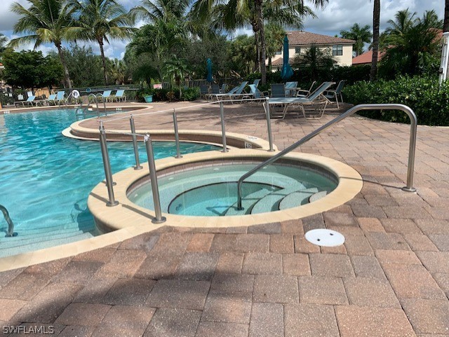 8976 Water Tupelo Road Fort Myers, FL 33912 - Photo 30 of 35 a view of outdoor space yard swimming pool and patio