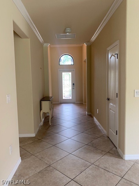 8976 Water Tupelo Road Fort Myers, FL 33912 - Photo 6 of 35 a view of a hallway with entryway door