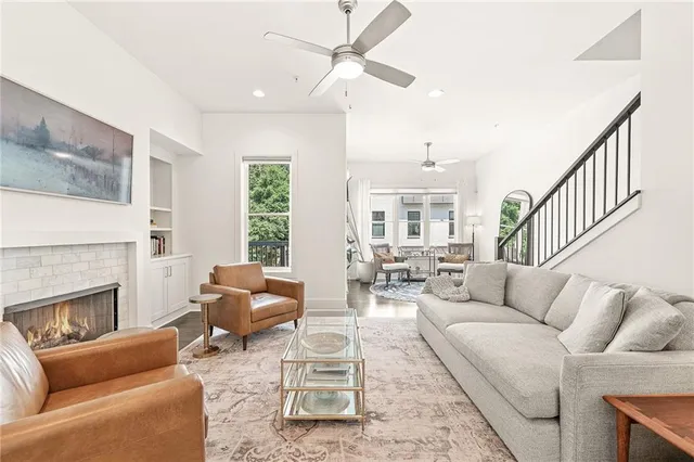 a living room with furniture or couch and a fireplace