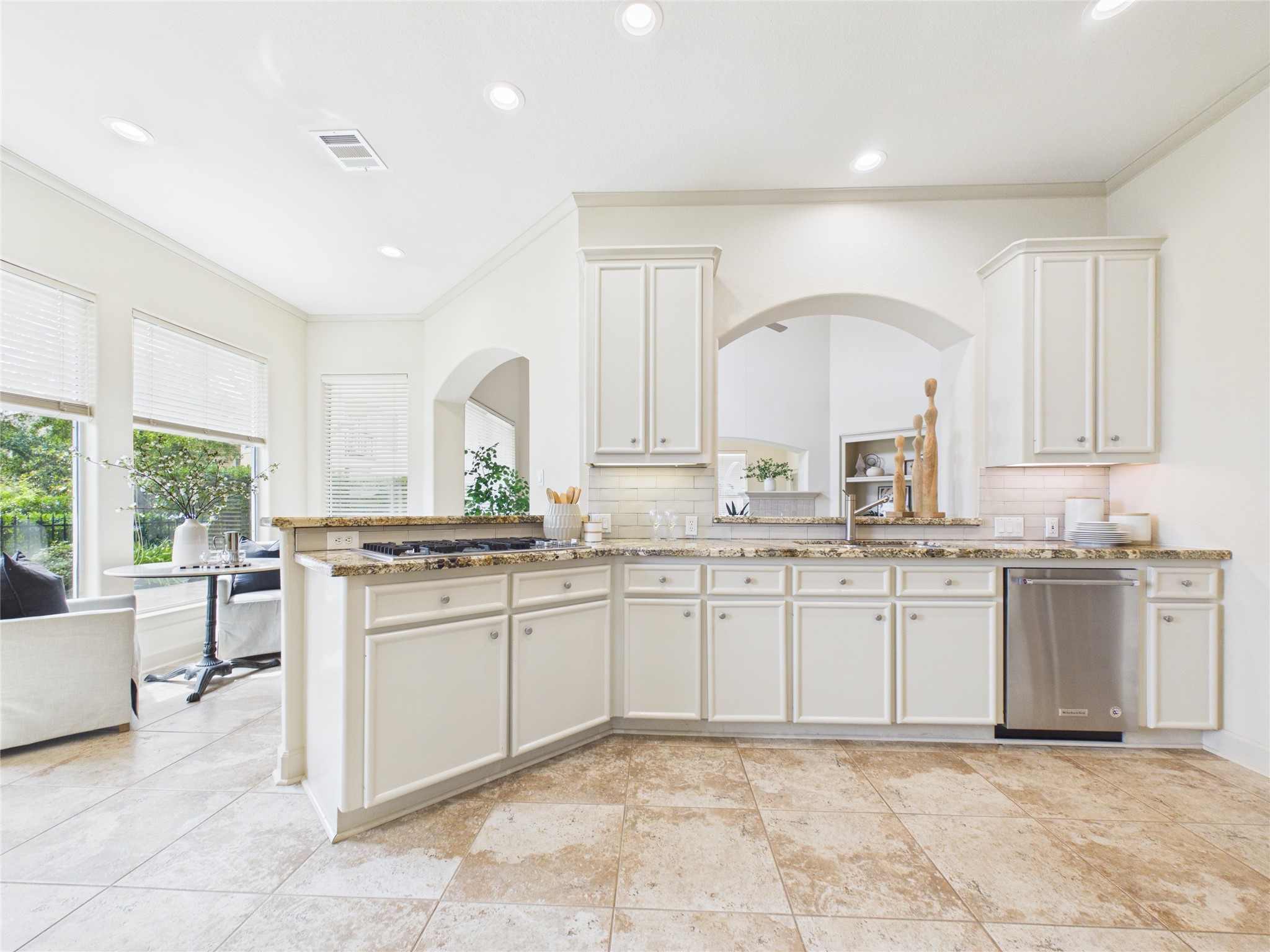 403 Harborside Way Kemah, TX 77565 - Photo 10 of 39 Jenn Air gas cooktop and updated steel appliances throughout this gorgeous kitchen