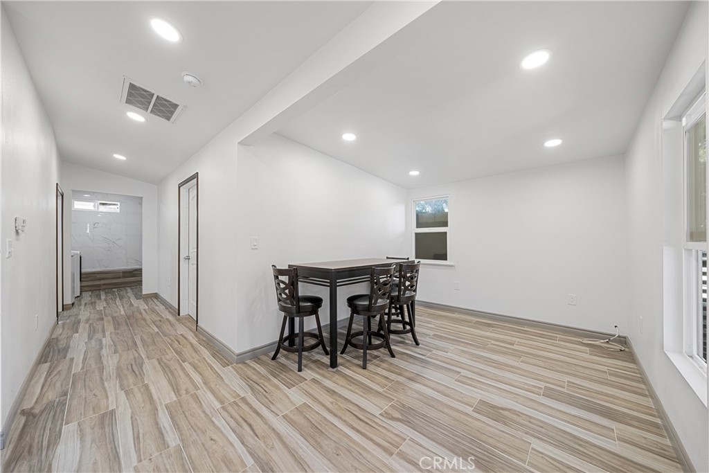 26251 Ravenhill Road Canyon Country, CA 91387 - Photo 20 of 64 a view of a room with furniture and wooden floor