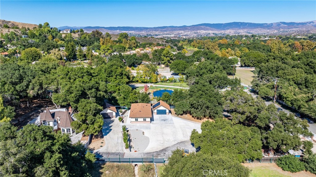 26251 Ravenhill Road Canyon Country, CA 91387 - Photo 39 of 64 an aerial view of a house with a yard