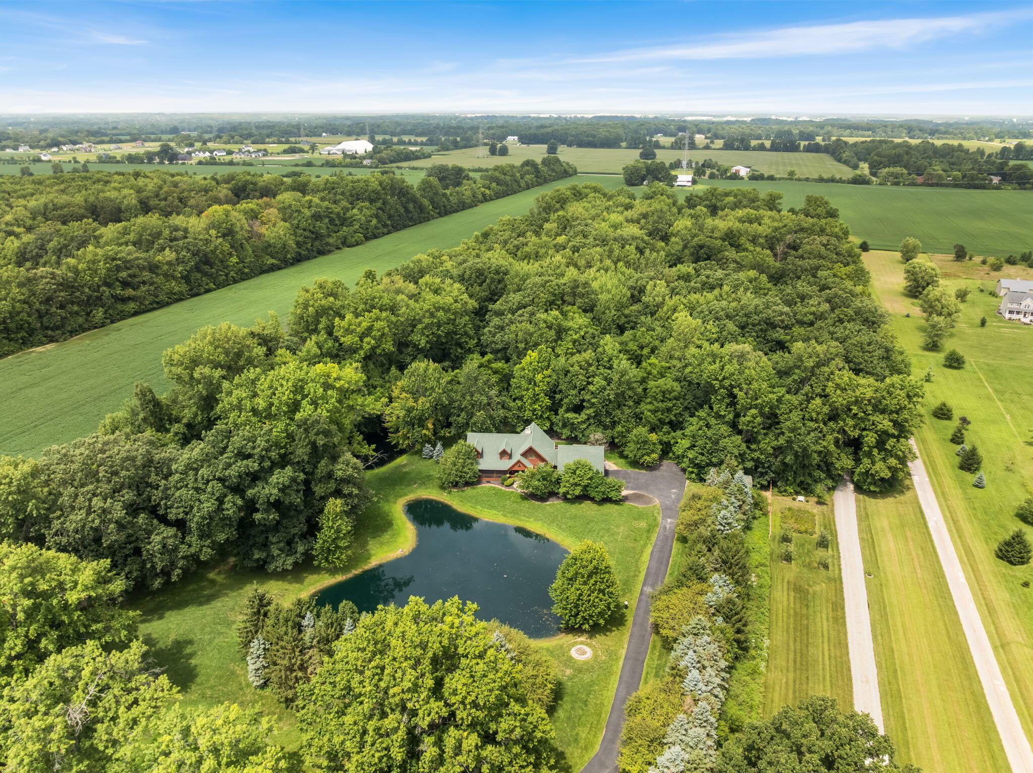 4040 Clark-Shaw Road Powell, OH 43065 - Photo 4 of 99 7-web-or-mls-DJI_20250807140524_0169_D