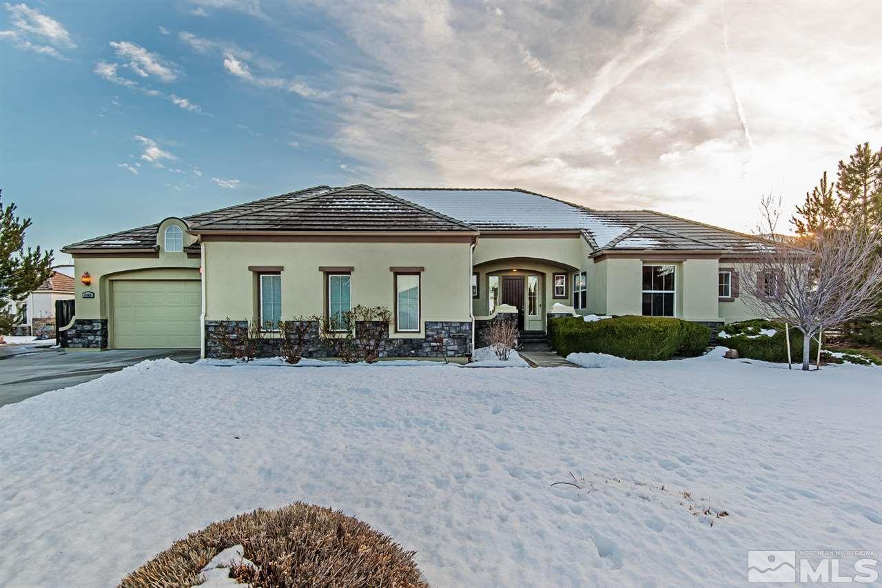 6965 Cour Street Reno, NV 89511 - Photo 1 of 25 a front view of a house with yard porch and outdoor seating
