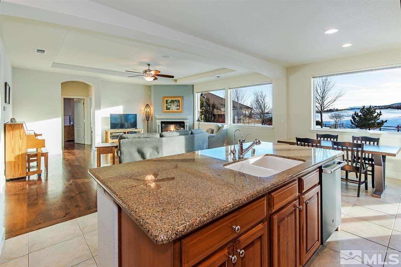 6965 Cour Street Reno, NV 89511 - Photo 14 of 25 a view of a kitchen counter top and living room